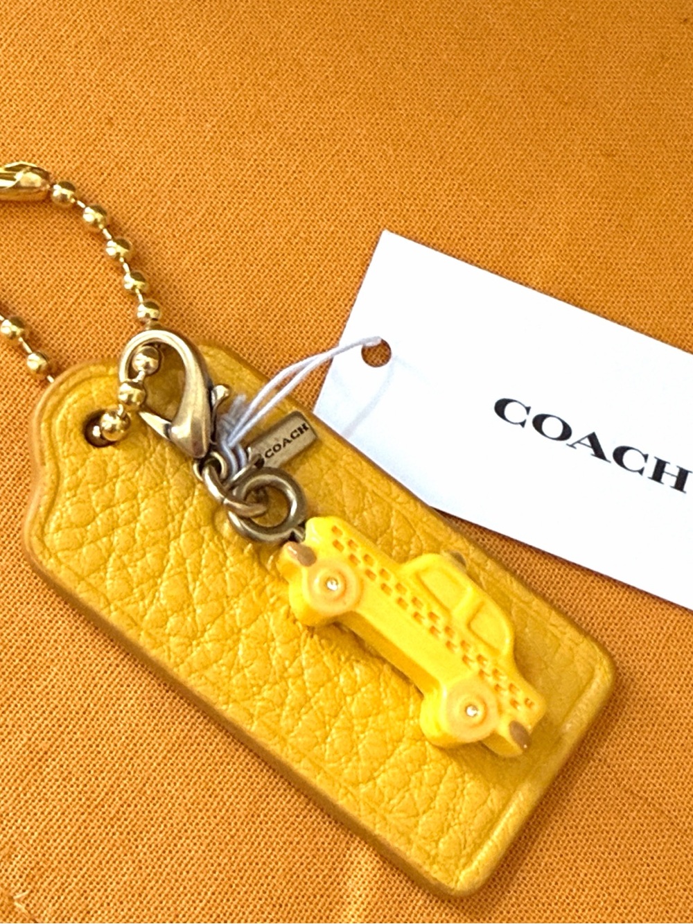 Coach Yellow Leather Hangtag with Taxi Auto Gold Hardware